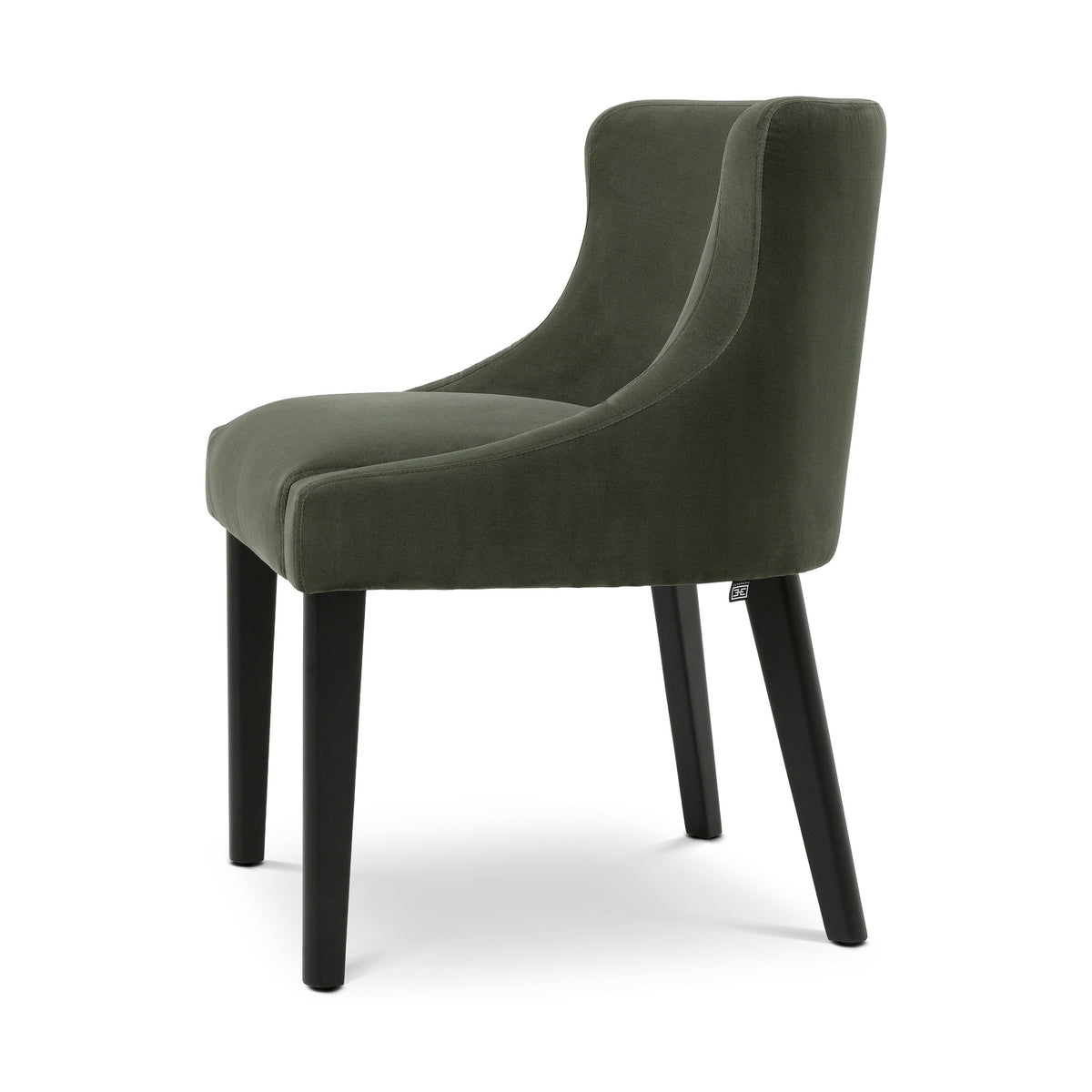 Side view of the Chavelle dining chair showing its Torrin green velvet seat and curved back