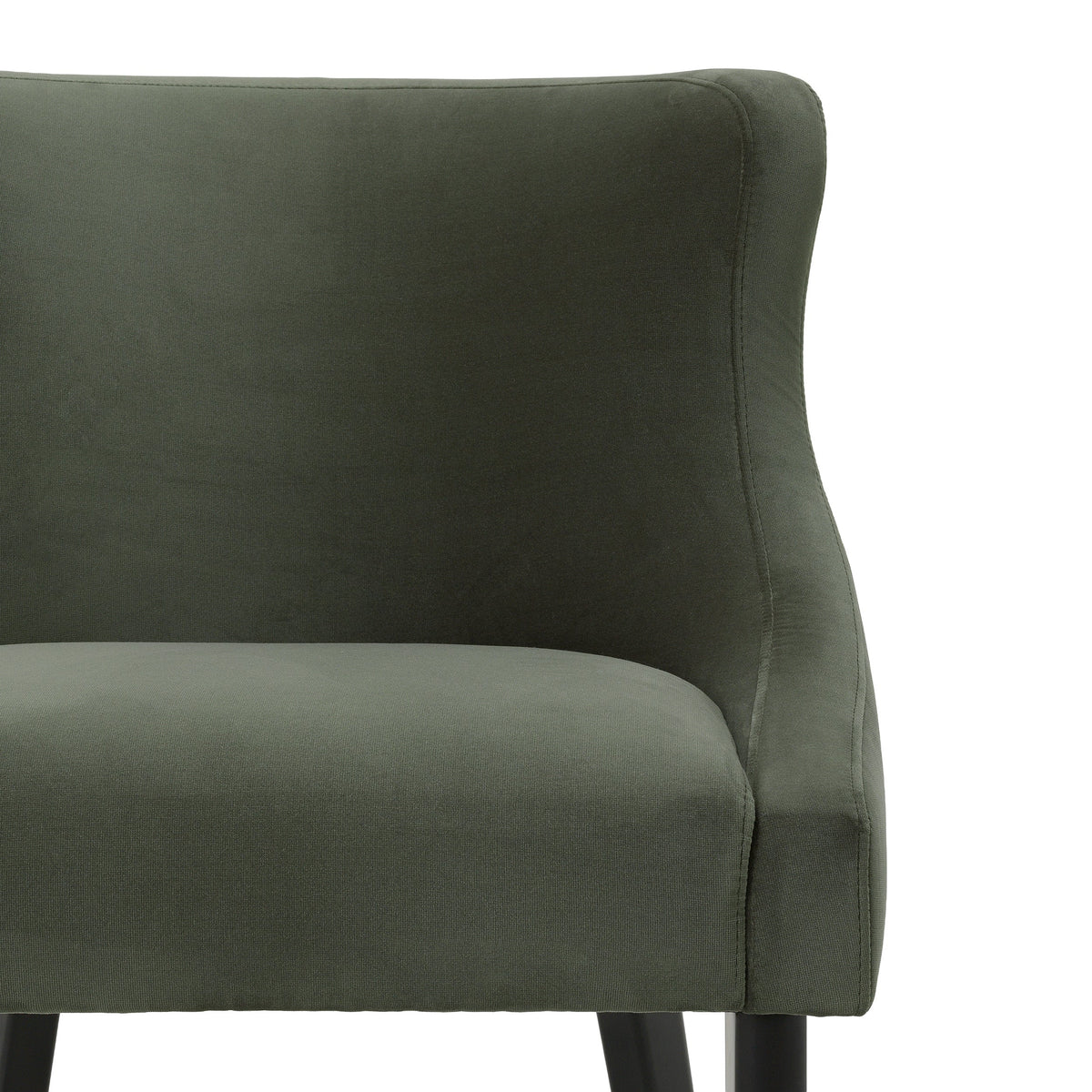 Close-up of the Chavelle dining chair green velvet backrest and upholstered seat