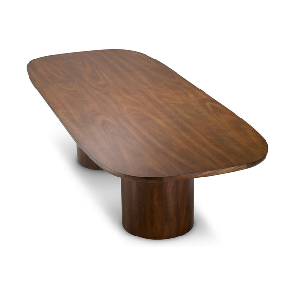 Eichholtz Glenmont Okoume dining table viewed from the end to show the oval top and round column legs
