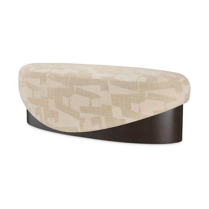 Raymond Bench in Brooklyn sand fabric with dark oak veneer base, three-quarter view